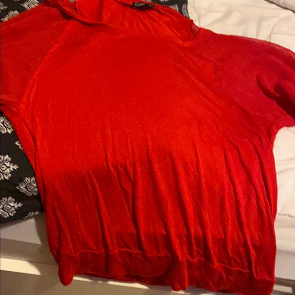 A red shirt form express perfect for a party